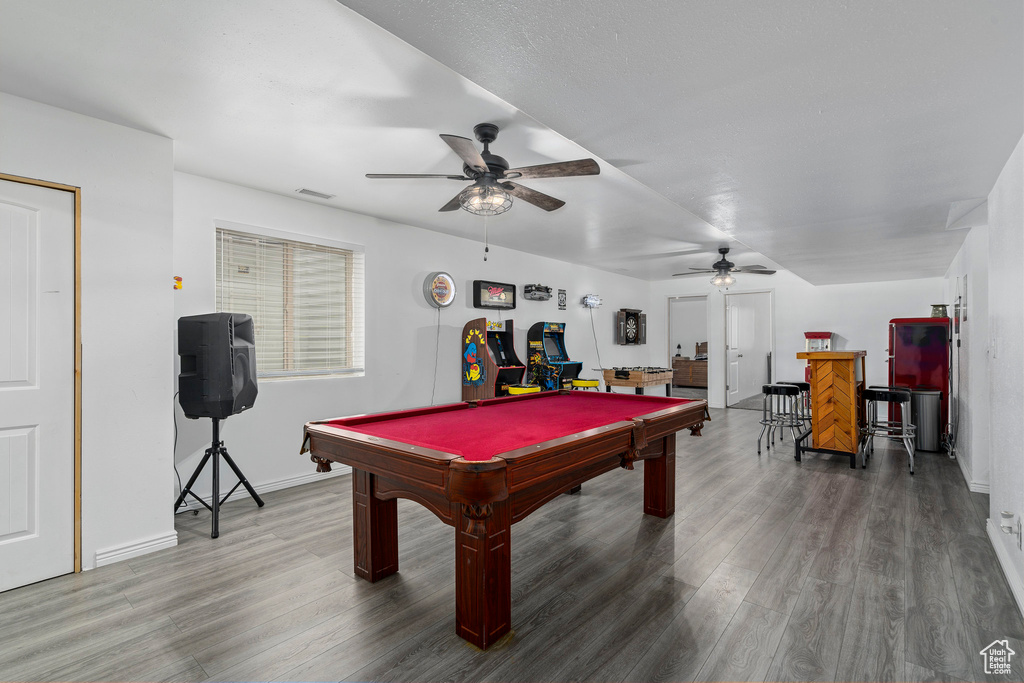 Rec room featuring wood-type flooring, ceiling fan, and billiards
