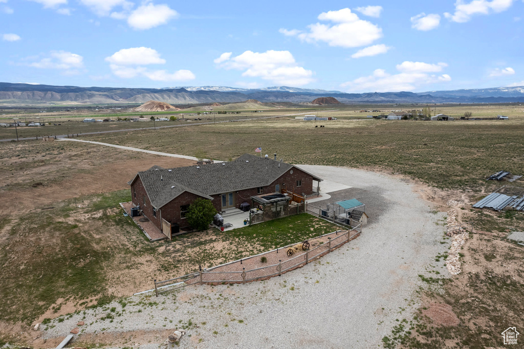 Drone / aerial view featuring a mountain view and a rural view