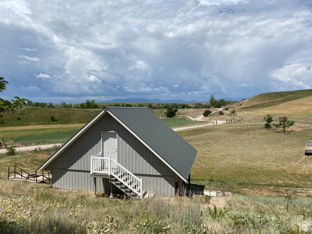 View of shed / structure featuring a rural view