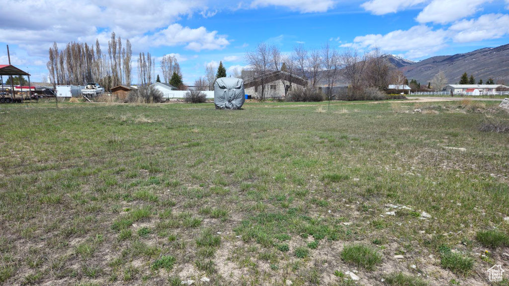 View of yard featuring a mountain view