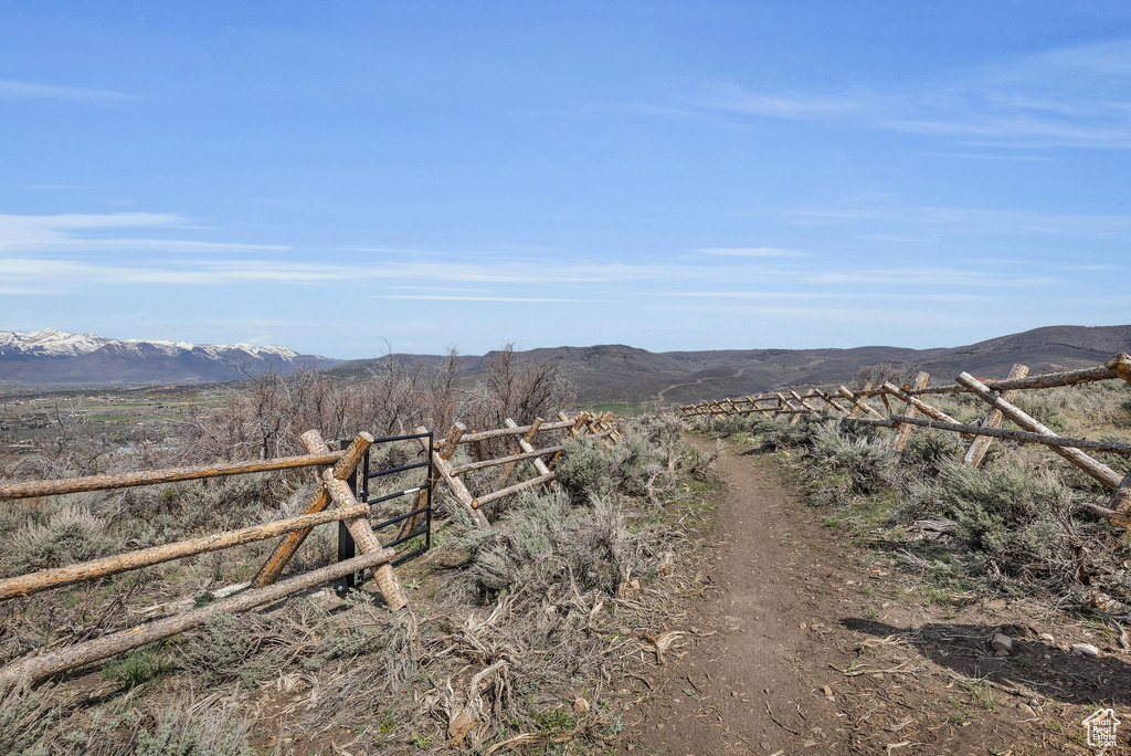 Property view of mountains with a rural view