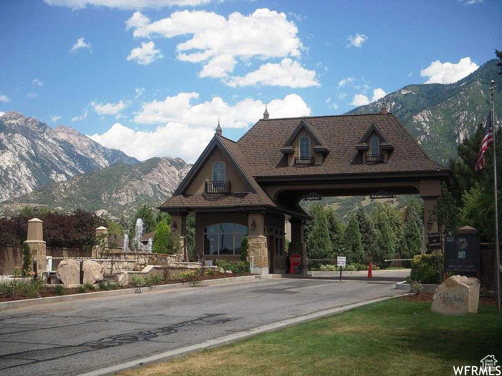 View of front of property featuring a mountain view