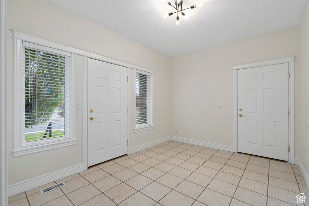 Foyer featuring light tile flooring