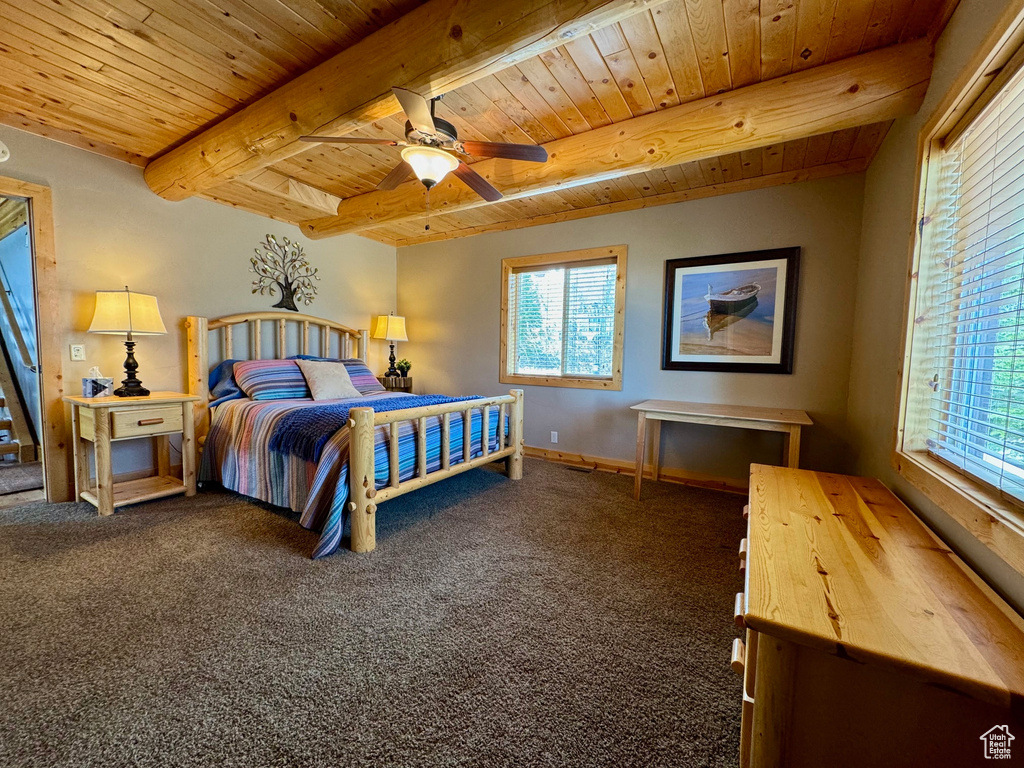 Bedroom with wooden ceiling, ceiling fan, carpet, and beamed ceiling