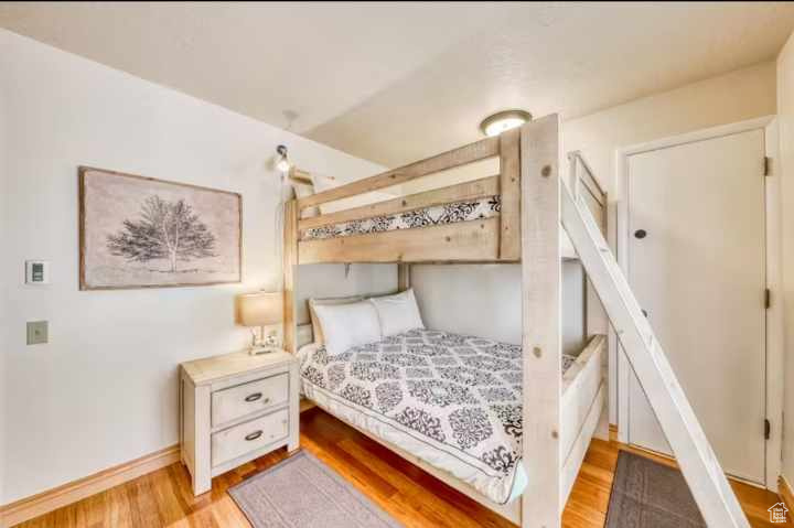 Bedroom featuring light wood-type flooring