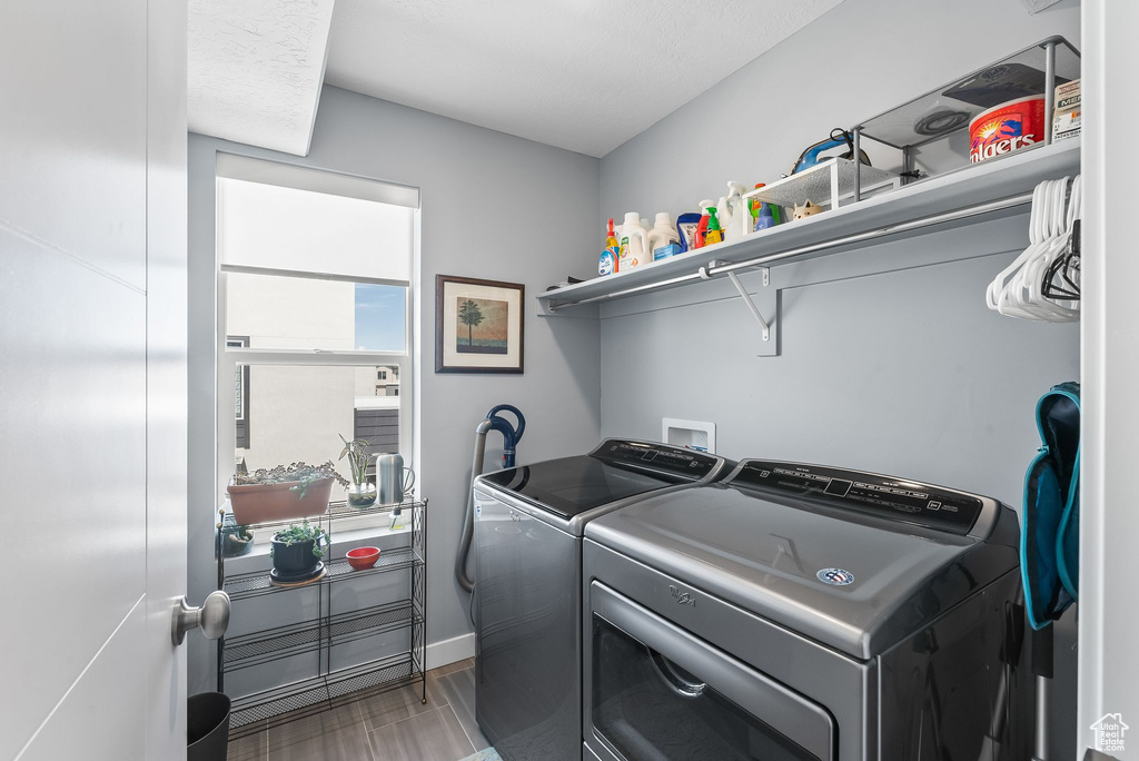 Laundry room with washer and dryer and washer hookup