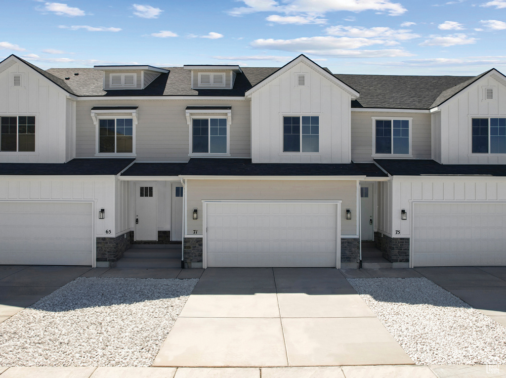 Multi unit property featuring a garage