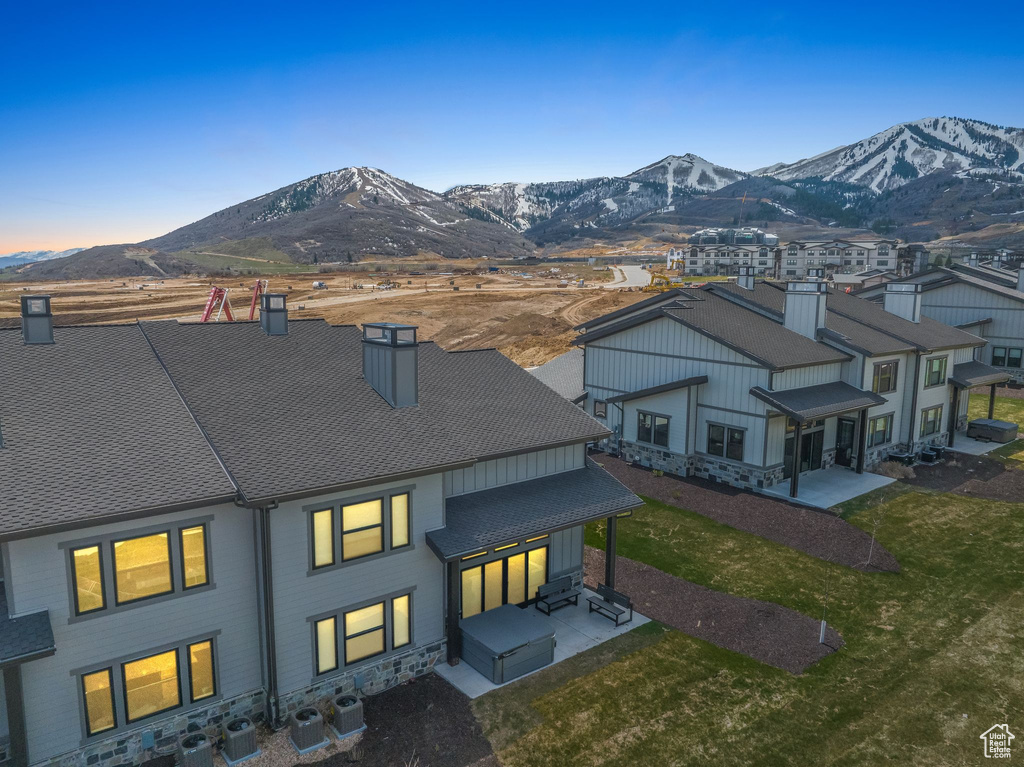 Aerial view at dusk with a mountain view