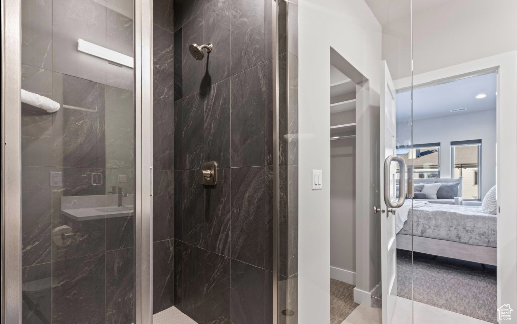 Bathroom featuring walk in shower