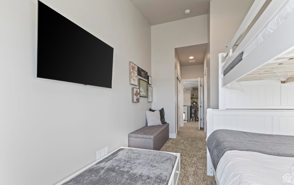 Bedroom with carpet flooring