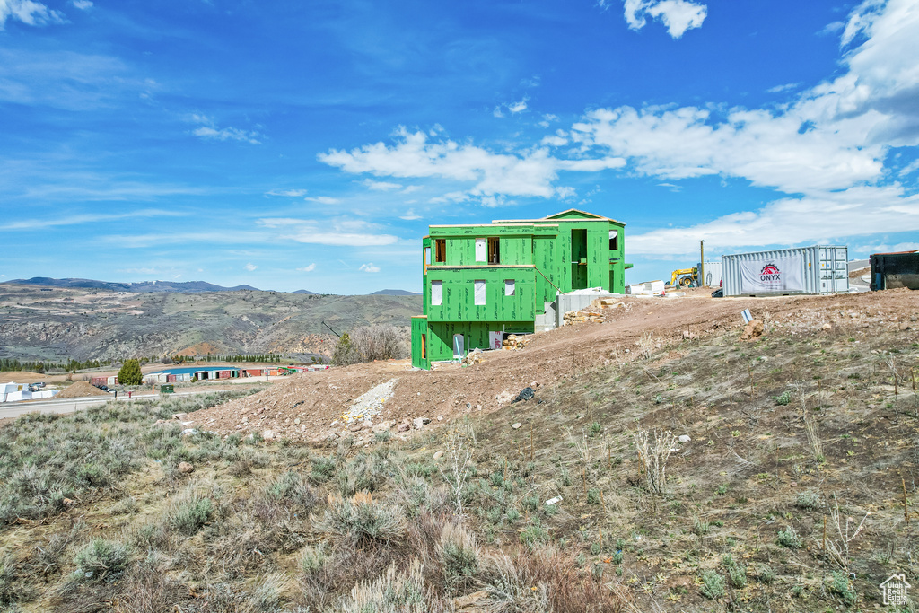 Exterior space featuring a mountain view