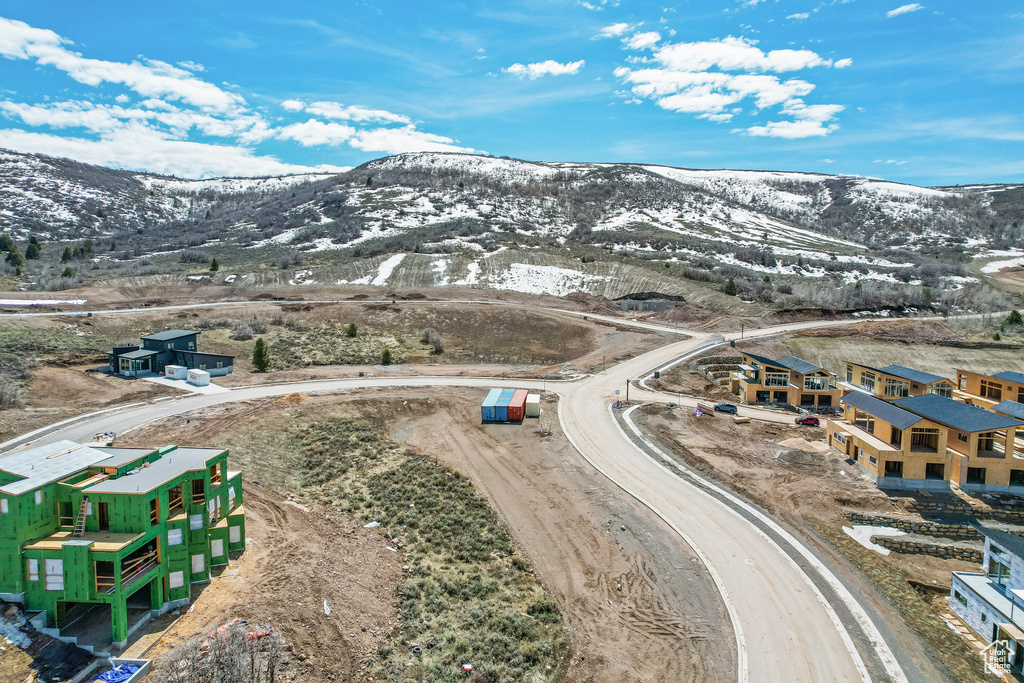 Birds eye view of property with a mountain view