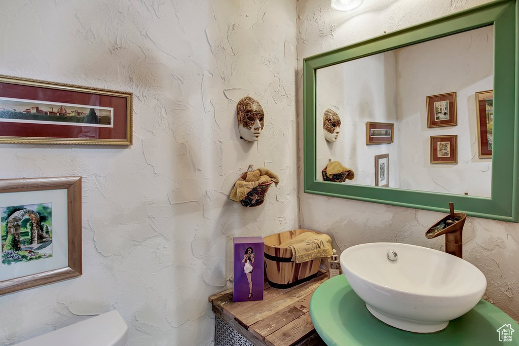 Bathroom with sink and toilet