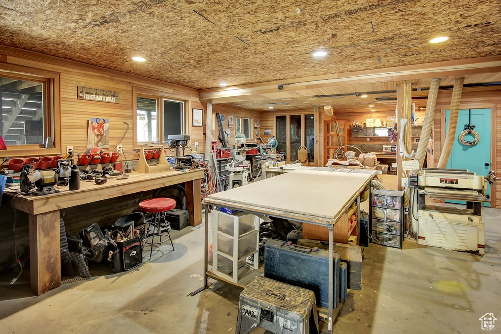 Interior space with concrete flooring and a workshop area