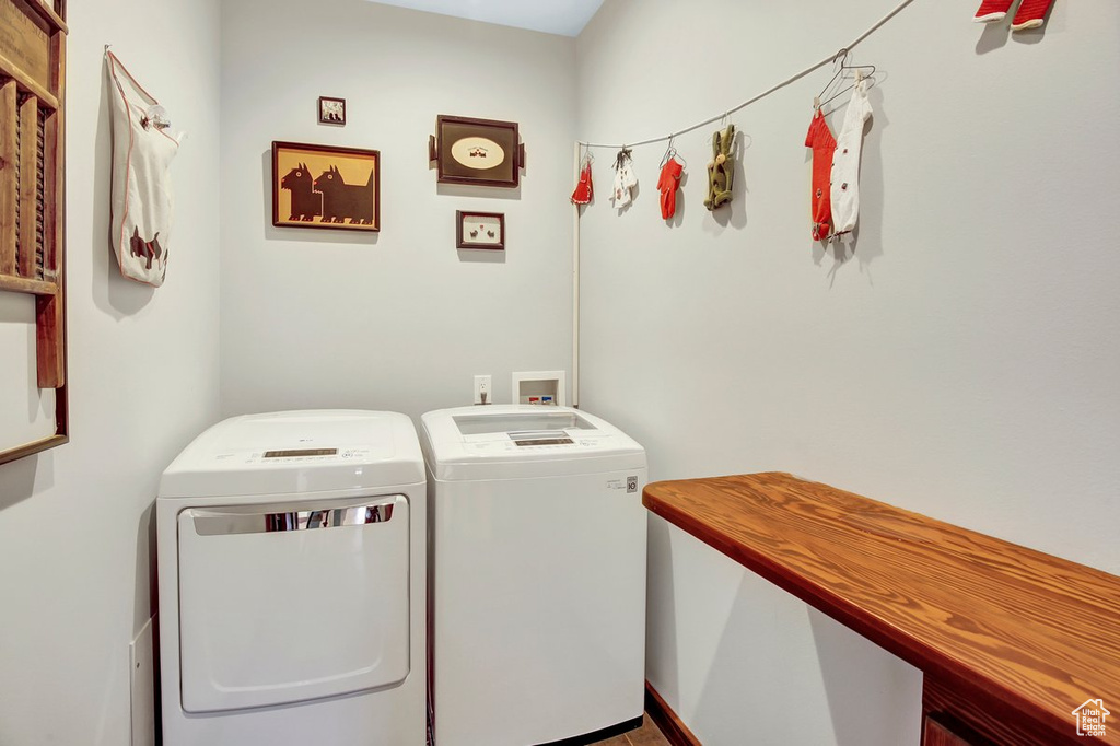 Laundry area with hookup for a washing machine and washer and clothes dryer