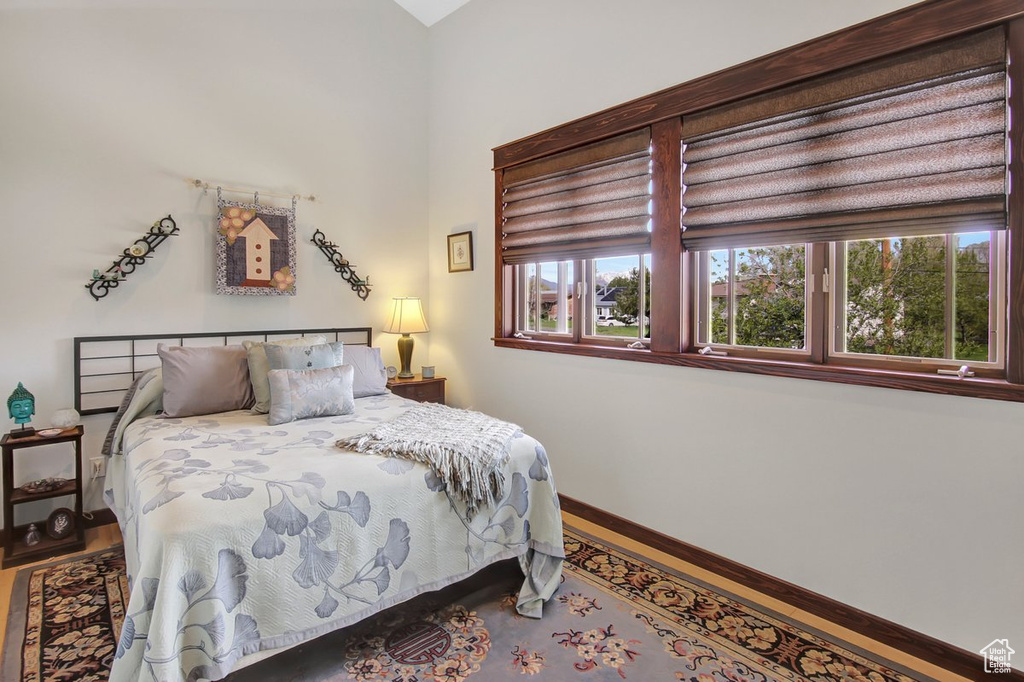 Bedroom featuring hardwood / wood-style flooring