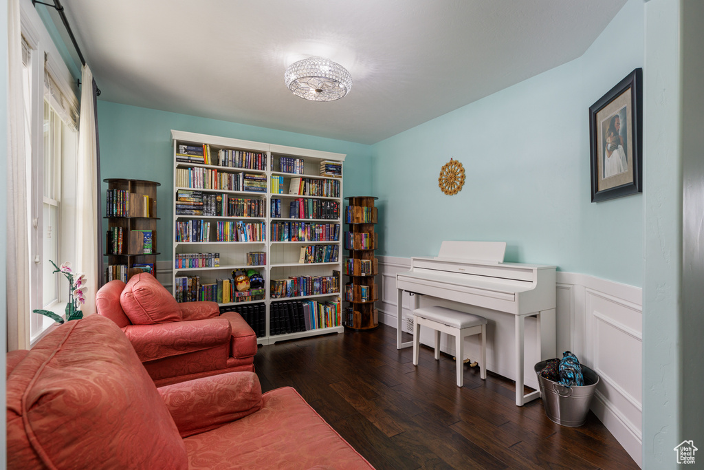 Living area with hardwood / wood-style floors