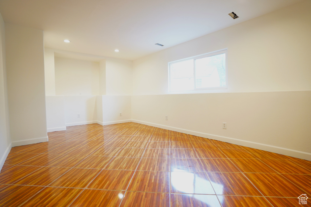 Unfurnished room with tile floors