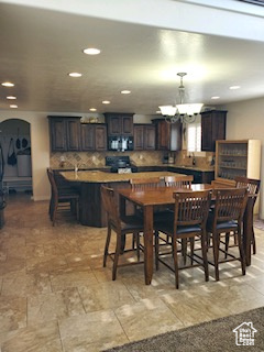 Dining area with light tile floors