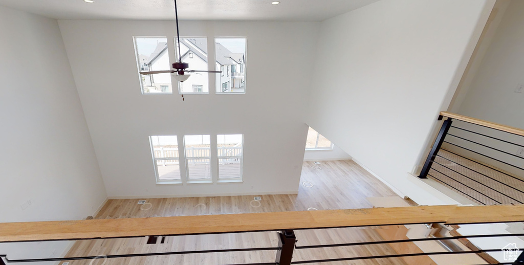 Interior space with a healthy amount of sunlight and wood-type flooring