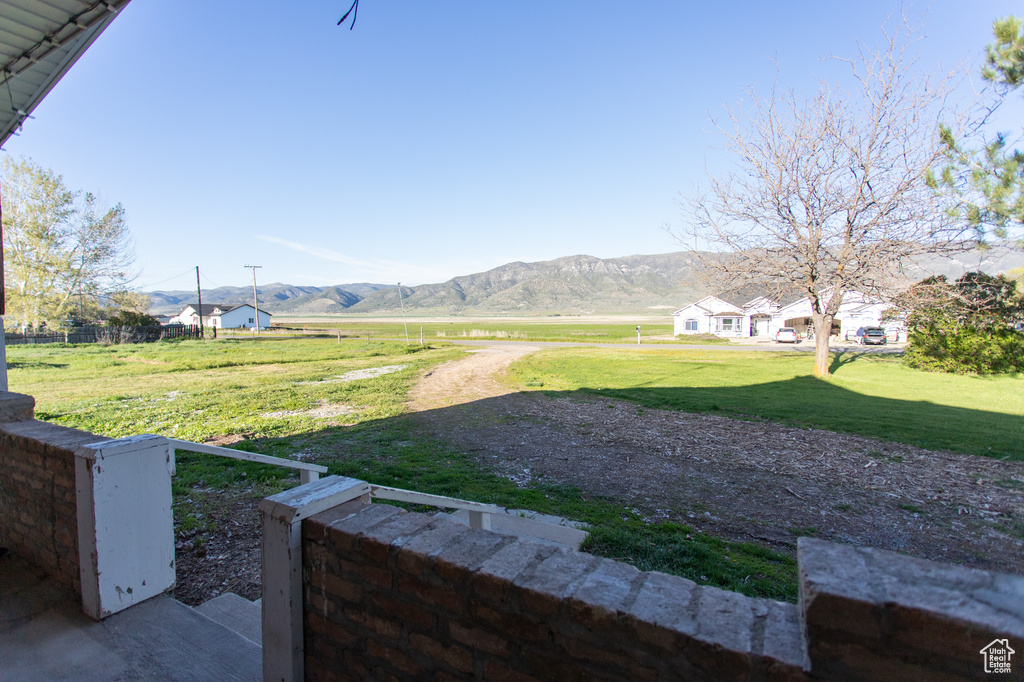View of yard with a mountain view