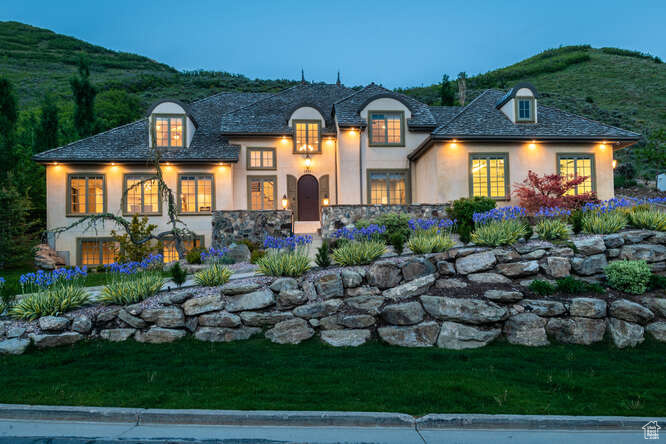 French country inspired facade featuring a mountain view