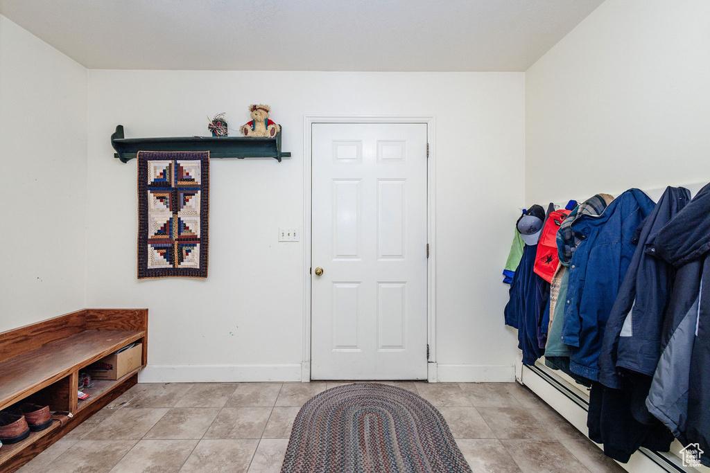 Mudroom with tile floors