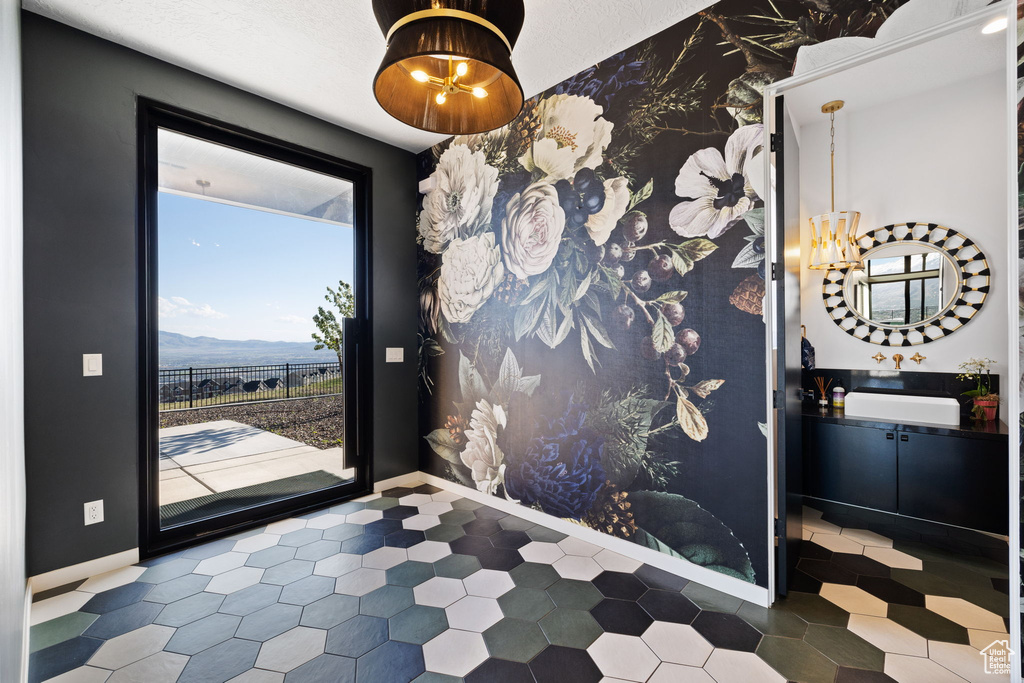 Interior space featuring a mountain view and tile floors