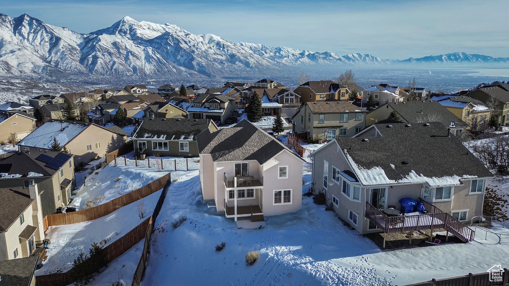 Snowy aerial view with a mountain view