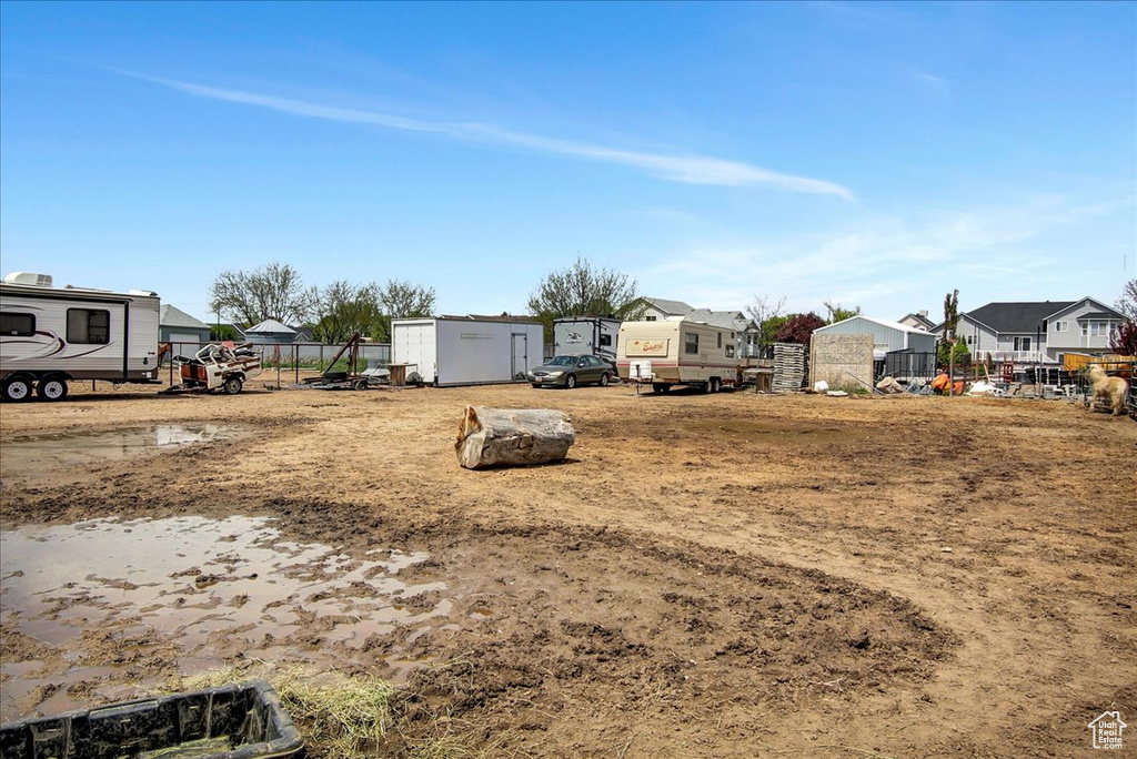 View of yard with a shed