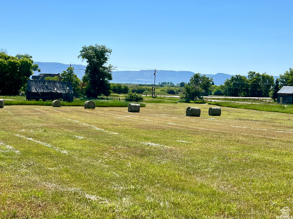 View of yard featuring a mountain view and a rural view