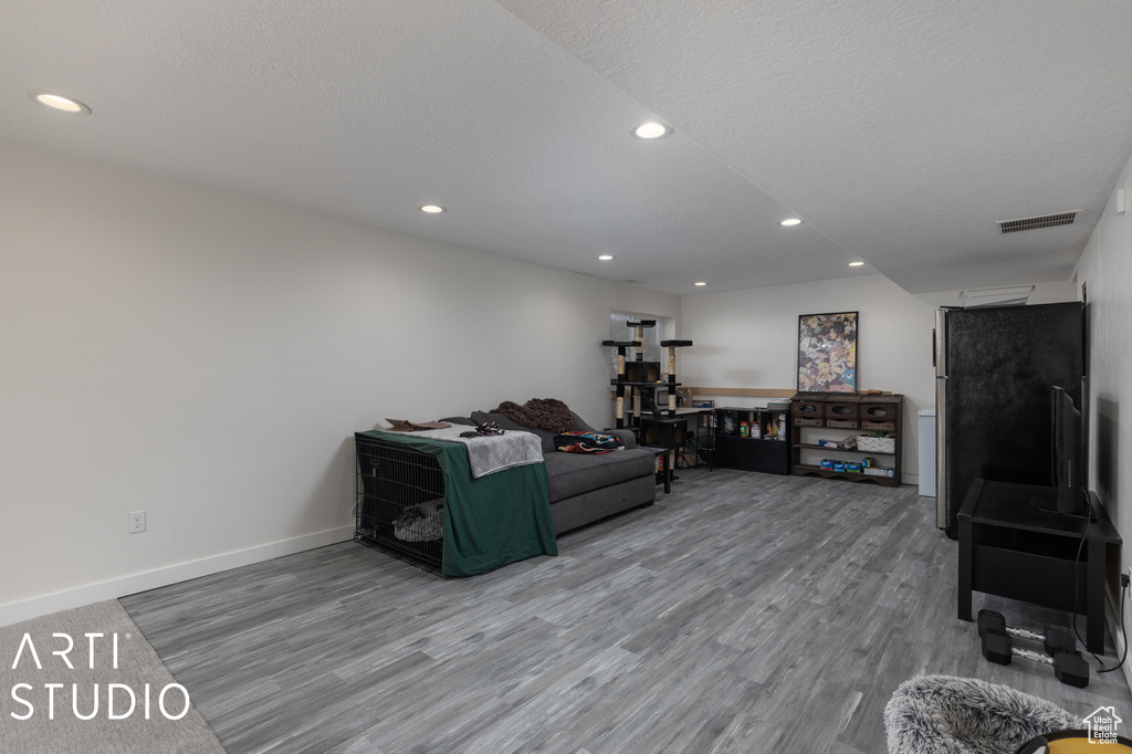 Living room with hardwood / wood-style floors