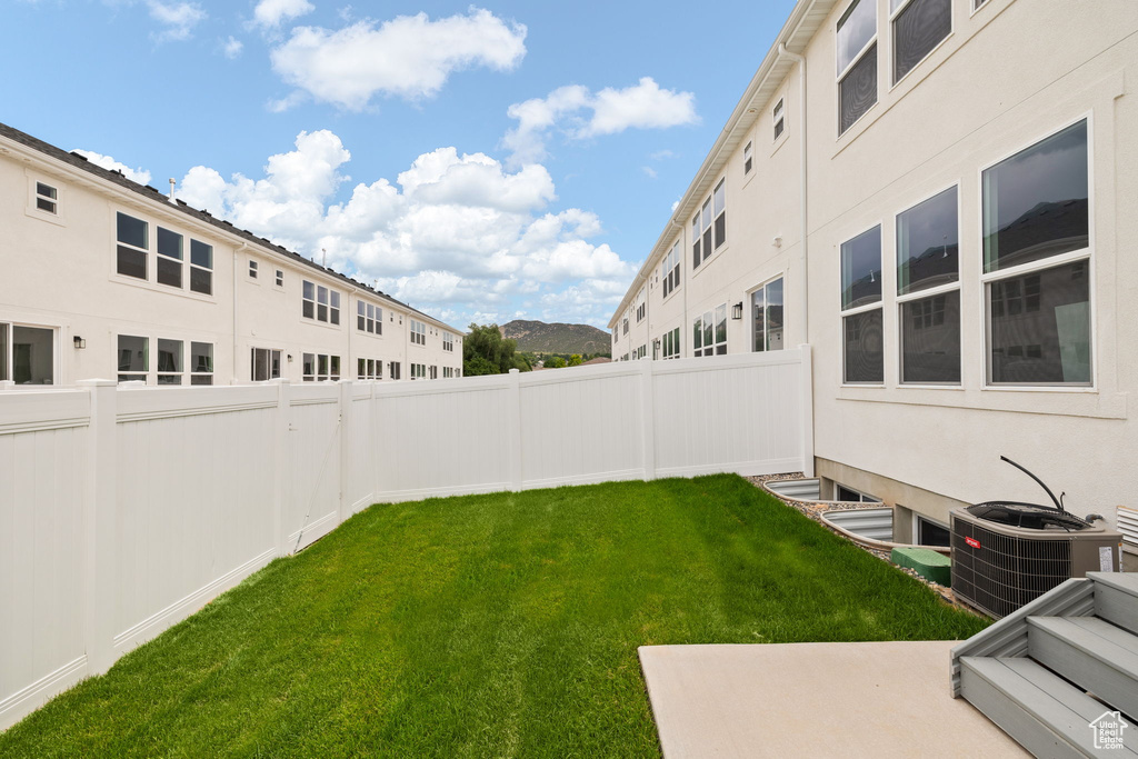 View of fenced backyard