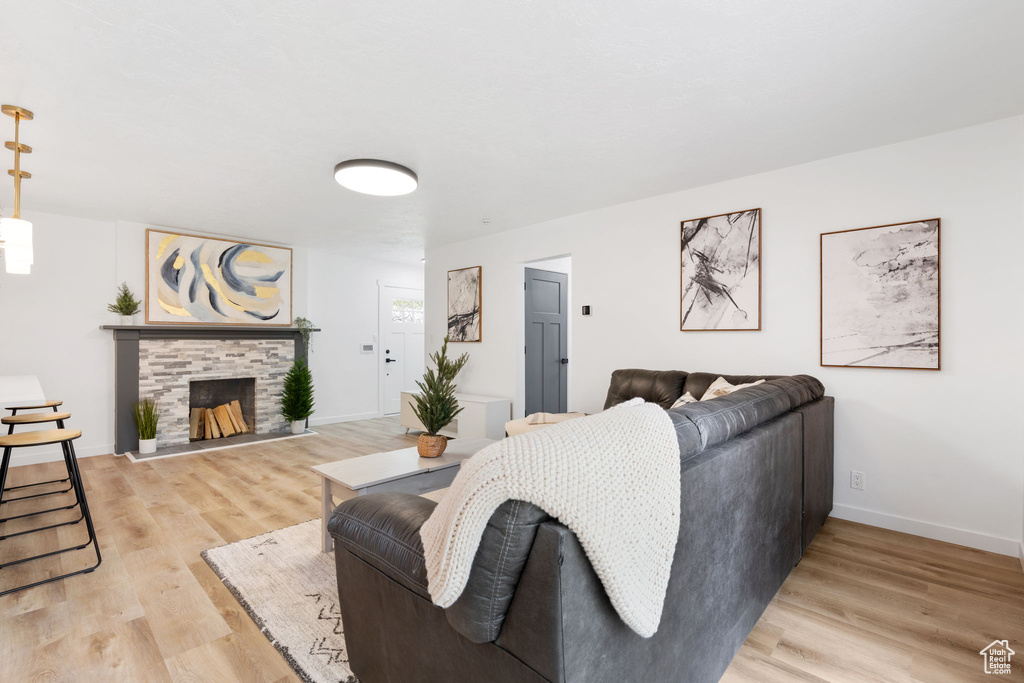 Living room with wood-type flooring