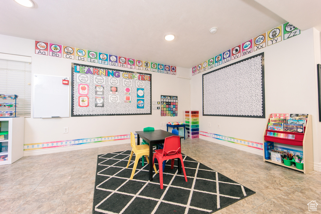 Playroom with tile flooring