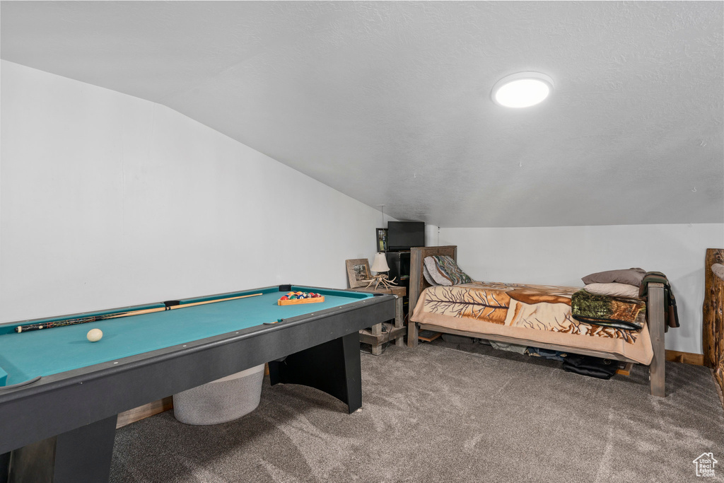 Playroom with lofted ceiling, carpet, and pool table
