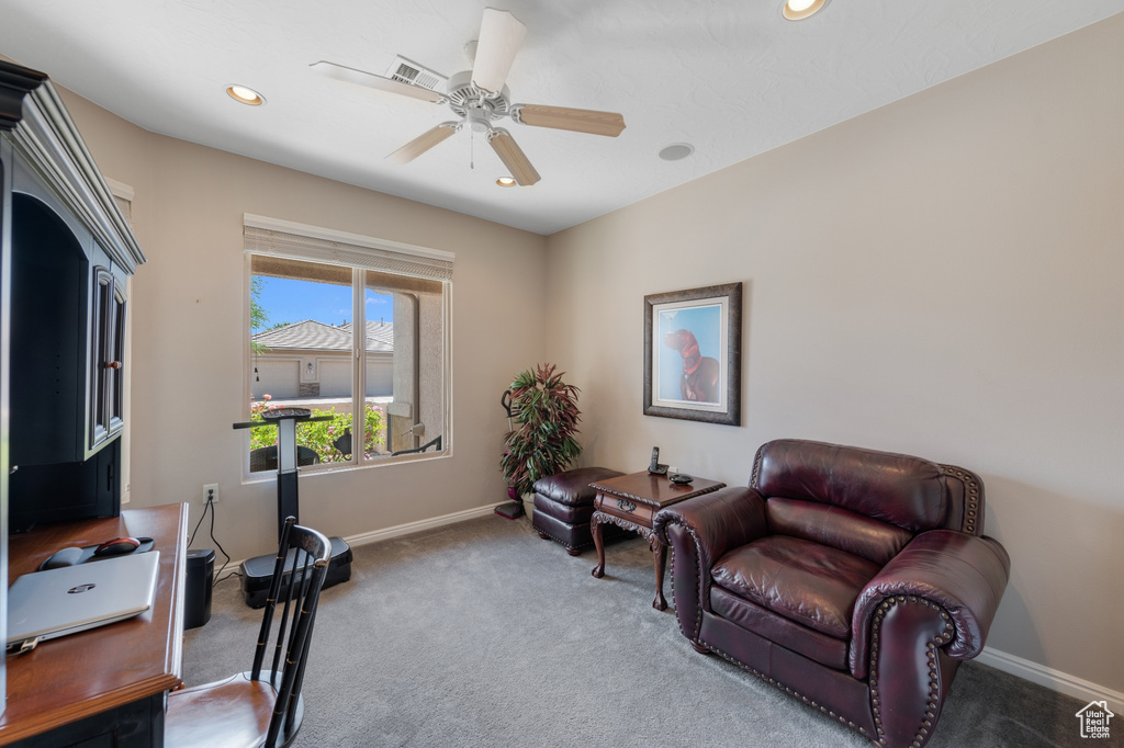 Sitting room with carpet floors and ceiling fan