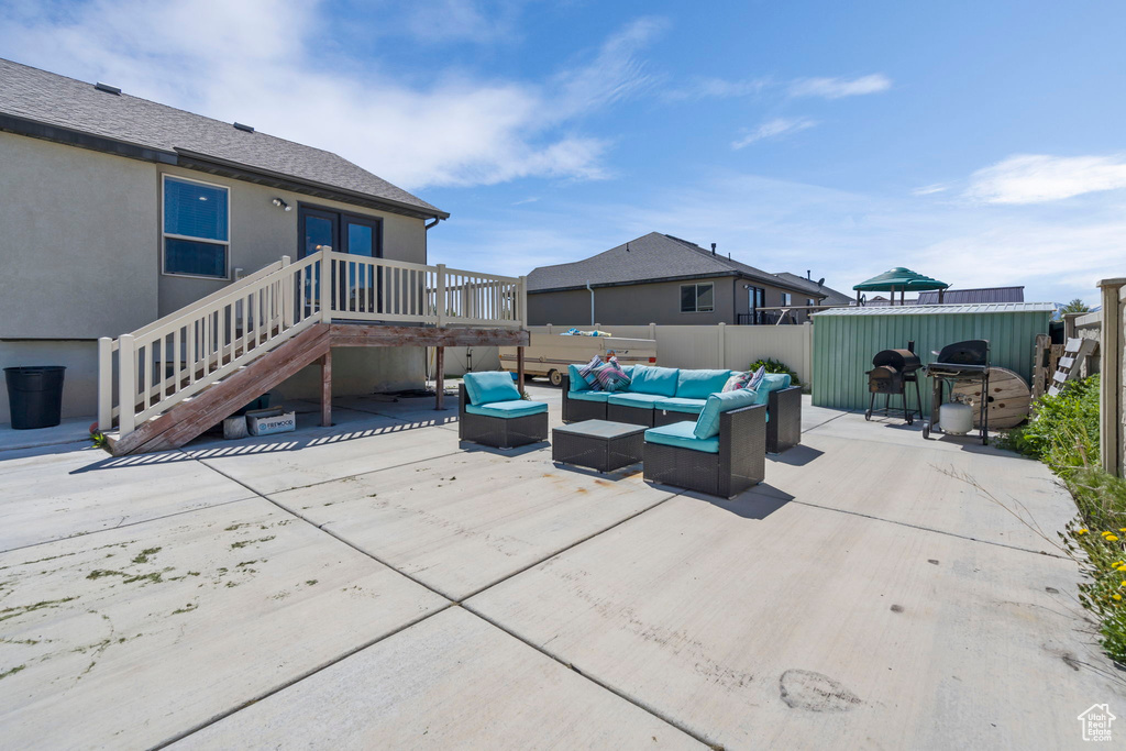 View of terrace featuring outdoor lounge area and a deck