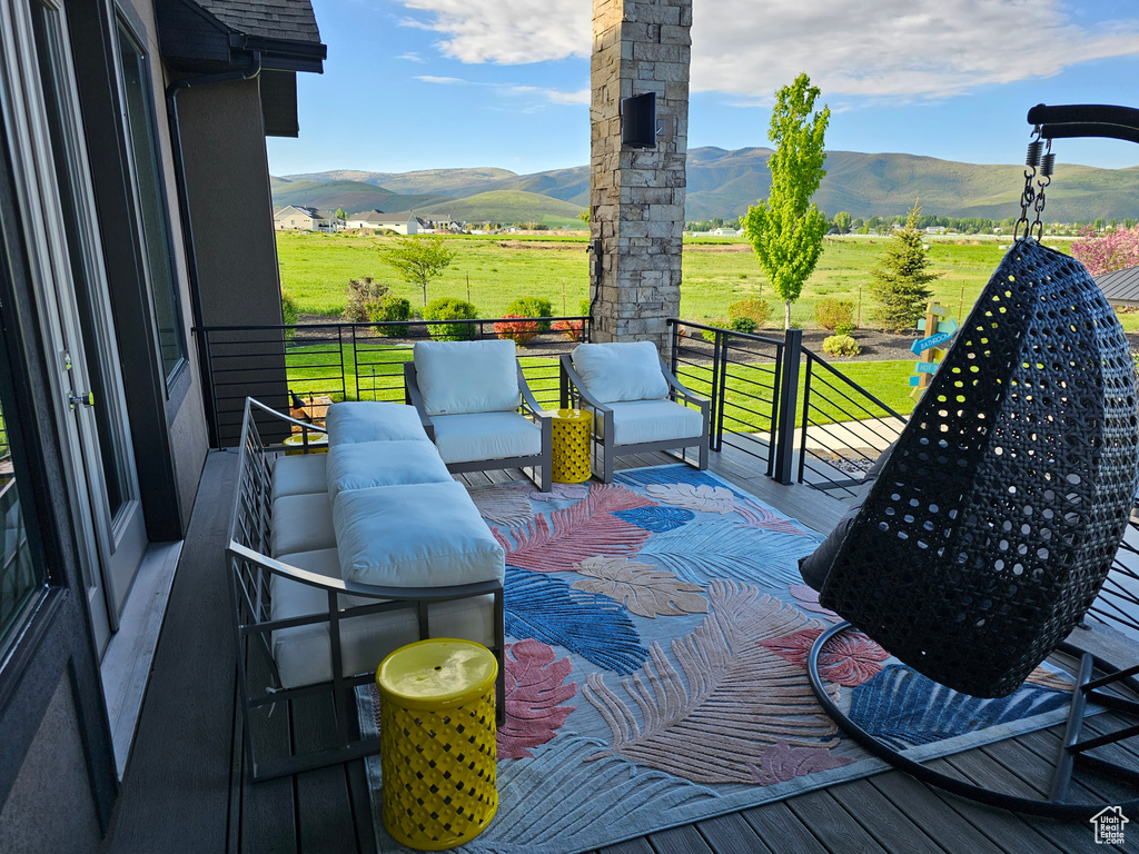 Exterior space featuring an outdoor living space and a mountain view