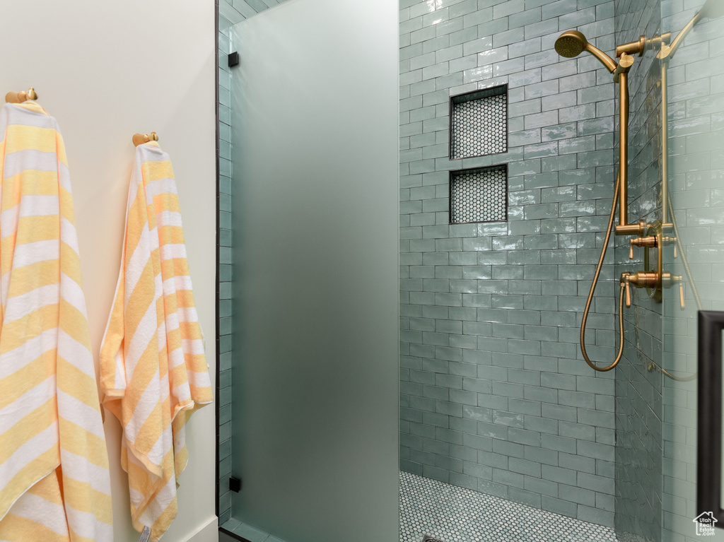 Bathroom with tiled shower