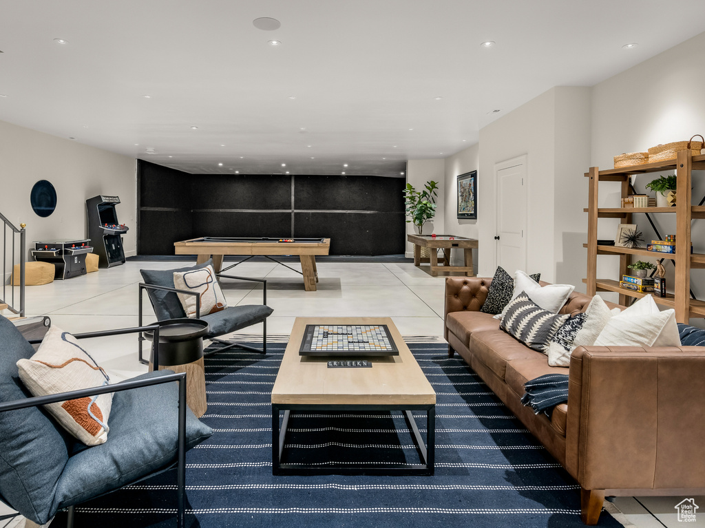 Tiled living room featuring pool table