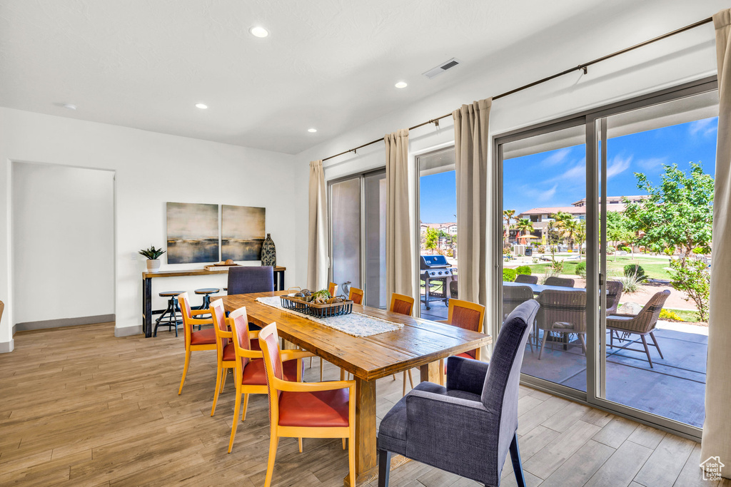 Dining space featuring light hardwood / wood-style floors