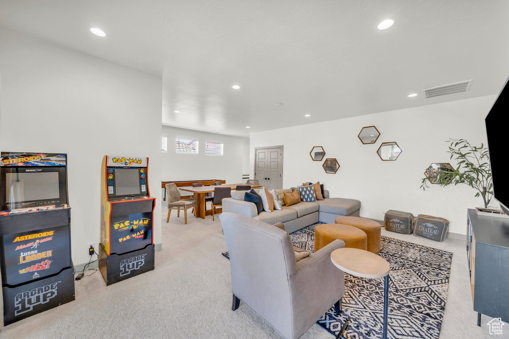 Living room featuring light colored carpet