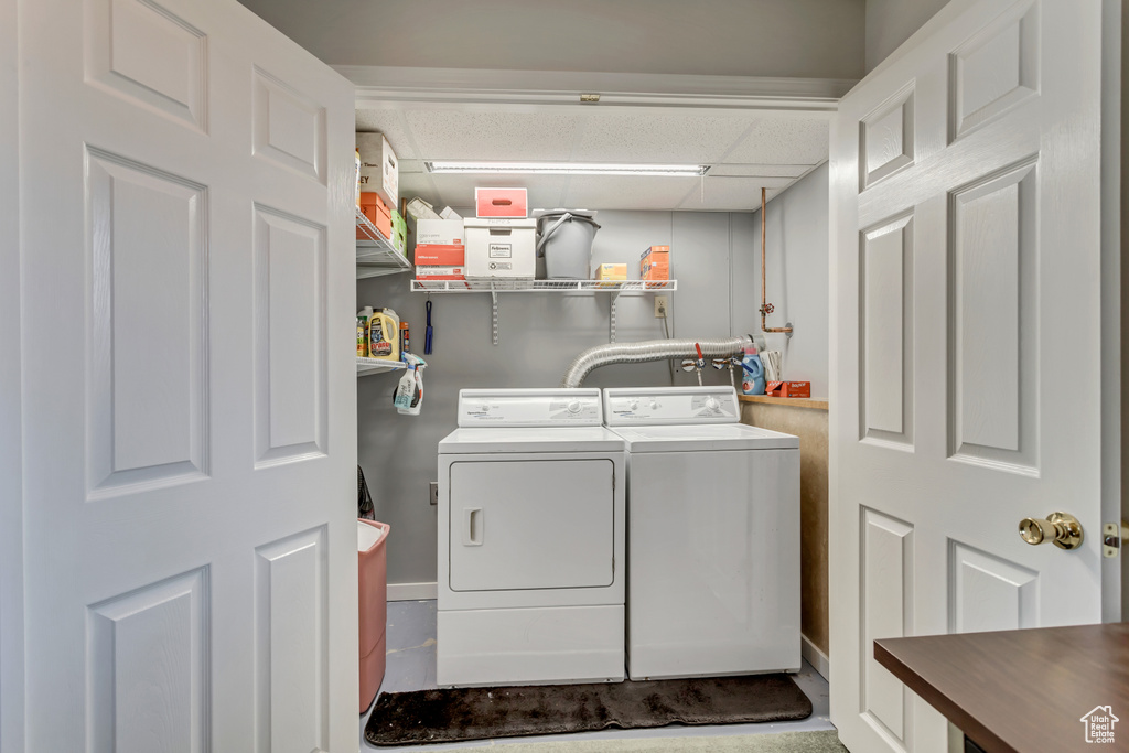 Laundry area featuring independent washer and dryer
