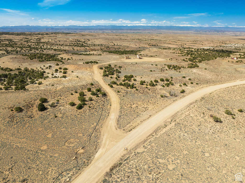 Birds eye view of property with a mountain view