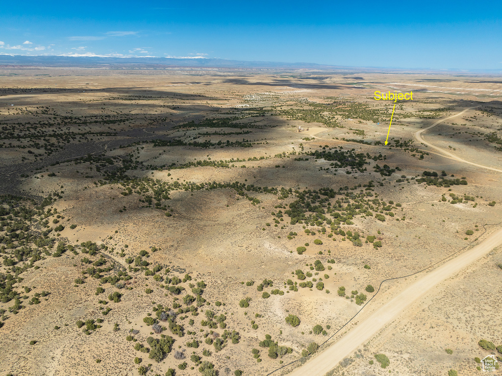 Birds eye view of property featuring a rural view