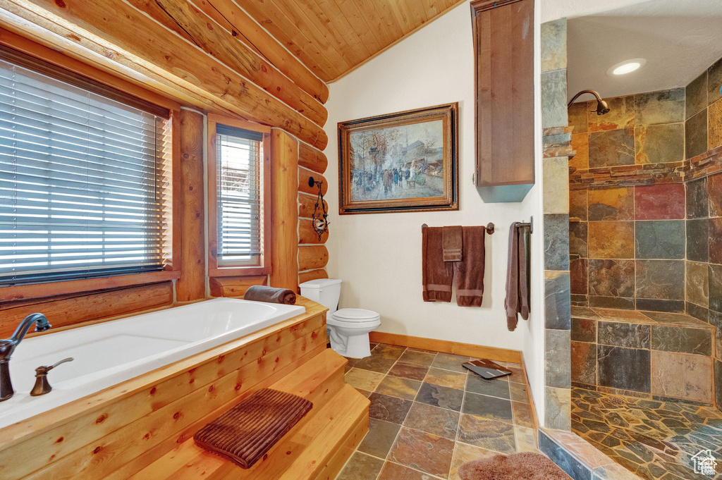 Bathroom featuring separate shower and tub, tile flooring, vaulted ceiling, wood ceiling, and toilet