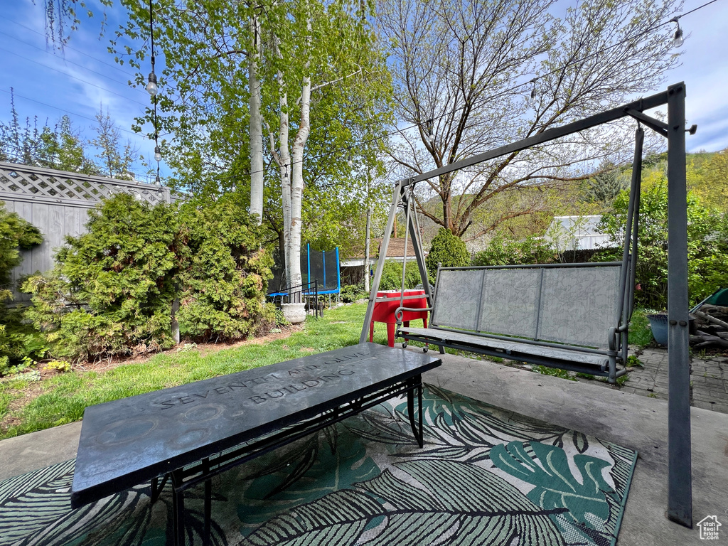 View of terrace with a trampoline