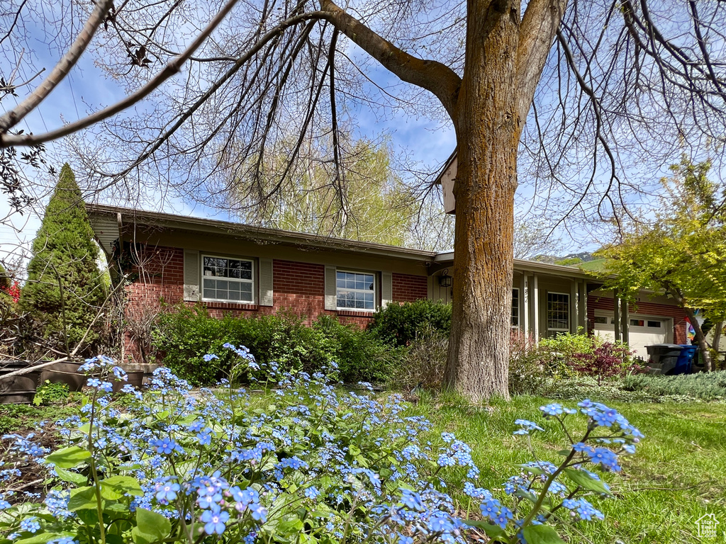 Ranch-style home with a garage