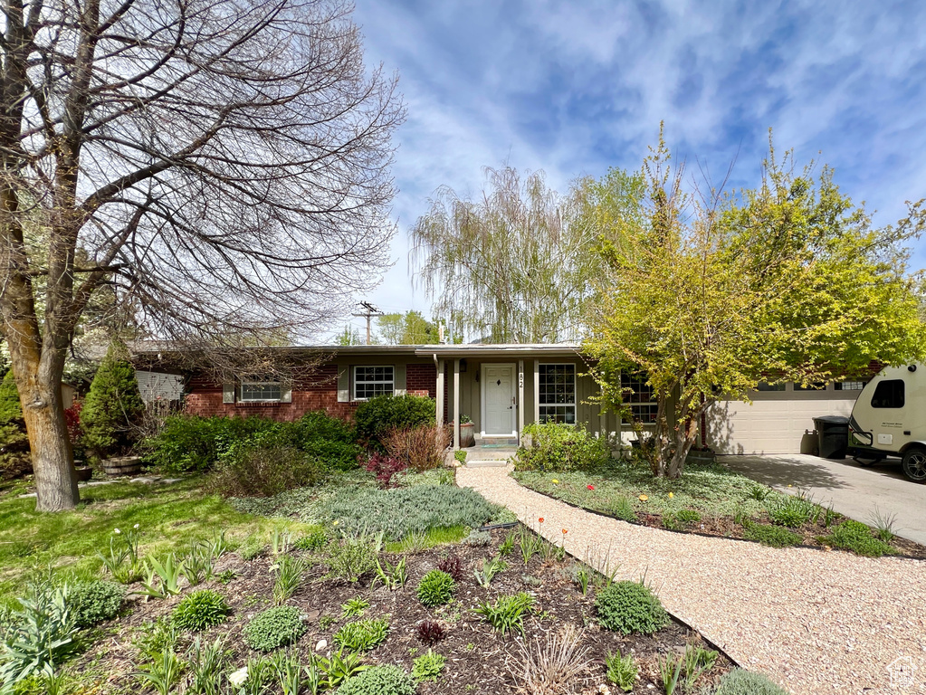 View of front of property featuring a garage